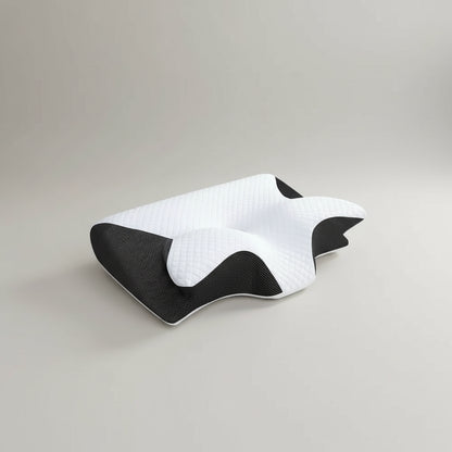 Image produit Oreiller ergonomique cervical noir et blanc sur fond beige