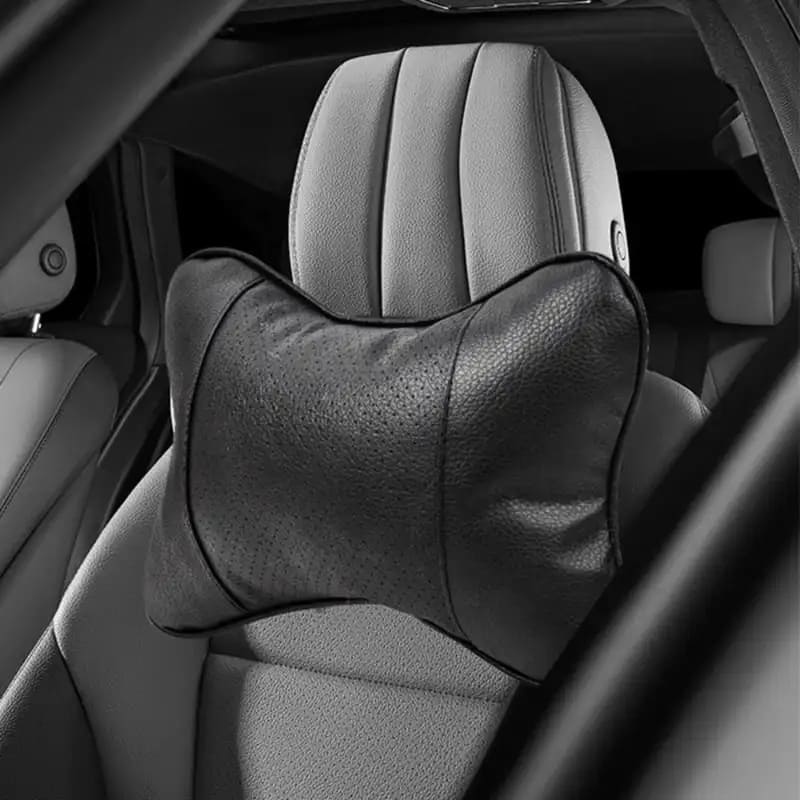 Coussin repose-tête ergonomique en cuir noir perforé pour siège de voiture