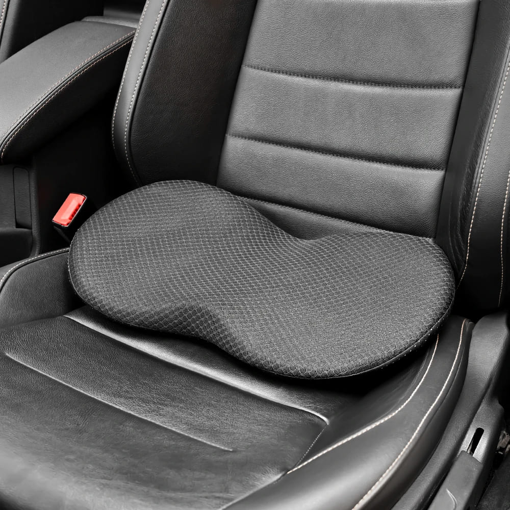 Schéma des dimensions d'un oreiller cervical ergonomique blanc : longueur de 50 cm, largeur de 30 cm, avec une double hauteur de 10 cm et 5,5 cm pour le soutien de la nuque.